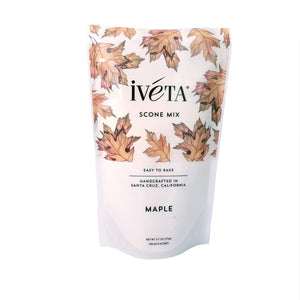 Front: iveta Maple Scone Mix. A bag of dry ingredients for making rich and flavorful maple scones. The mix may have a light brown color from the maple sugar. "Easy to Bake" and "Handcrafted in Santa Cruz, California" are also on the bag.
